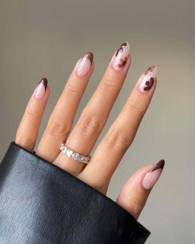 "Elegant almond-shaped nails with chic nude polish, perfect for professional women and fashion-forward brides" "Trendy almond nail design: soft pastel ombré with subtle glitter, ideal for college girls and young professionals" "Sophisticated almond nail art: minimal geometric accents in metallic tones, bridging work and party styles" "Romantic almond nails: soft pink gradient with delicate pearl embellishments, perfect for wedding celebrations" "Bold almond nail statement: deep burgundy with matte finish, empowering look for confident women" "Versatile almond nail design: neutral base with intricate white lace-like patterns, suitable for teachers and creatives" "Glamorous almond nails: holographic shine meets classic French tip, celebrating feminine elegance" "Winter-inspired almond nails: icy blue with silver snowflake details, chic for holiday parties" "Vibrant almond nail art: tropical sunset ombré with golden highlights, perfect for Valentine's celebrations" "Minimalist almond nails: clean nude base with single accent rhinestone, embodying understated sophistication"
