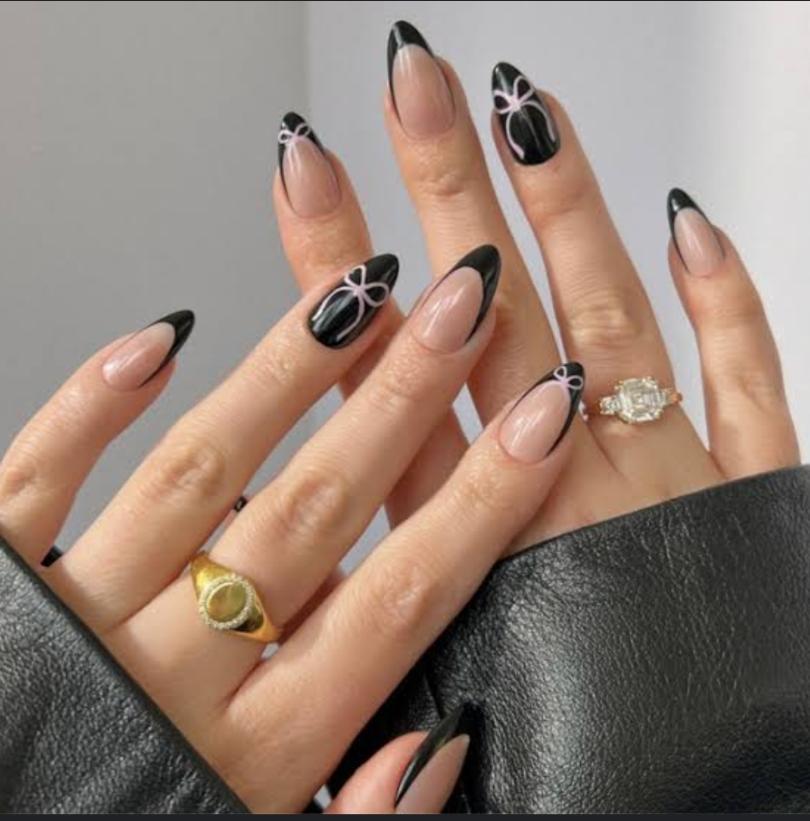 "Elegant almond-shaped nails with chic nude polish, perfect for professional women and fashion-forward brides"
"Trendy almond nail design: soft pastel ombré with subtle glitter, ideal for college girls and young professionals"
"Sophisticated almond nail art: minimal geometric accents in metallic tones, bridging work and party styles"
"Romantic almond nails: soft pink gradient with delicate pearl embellishments, perfect for wedding celebrations"
"Bold almond nail statement: deep burgundy with matte finish, empowering look for confident women"
"Versatile almond nail design: neutral base with intricate white lace-like patterns, suitable for teachers and creatives"
"Glamorous almond nails: holographic shine meets classic French tip, celebrating feminine elegance"
"Winter-inspired almond nails: icy blue with silver snowflake details, chic for holiday parties"
"Vibrant almond nail art: tropical sunset ombré with golden highlights, perfect for Valentine's celebrations"
"Minimalist almond nails: clean nude base with single accent rhinestone, embodying understated sophistication"
