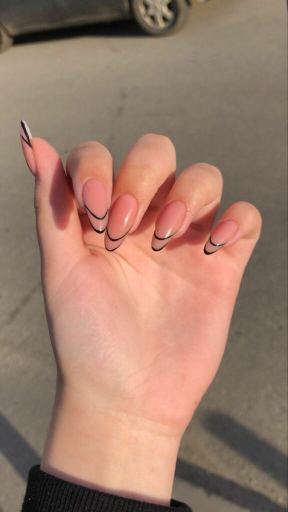 "Elegant almond-shaped nails with chic nude polish, perfect for professional women and fashion-forward brides"
"Trendy almond nail design: soft pastel ombré with subtle glitter, ideal for college girls and young professionals"
"Sophisticated almond nail art: minimal geometric accents in metallic tones, bridging work and party styles"
"Romantic almond nails: soft pink gradient with delicate pearl embellishments, perfect for wedding celebrations"
"Bold almond nail statement: deep burgundy with matte finish, empowering look for confident women"
"Versatile almond nail design: neutral base with intricate white lace-like patterns, suitable for teachers and creatives"
"Glamorous almond nails: holographic shine meets classic French tip, celebrating feminine elegance"
"Winter-inspired almond nails: icy blue with silver snowflake details, chic for holiday parties"
"Vibrant almond nail art: tropical sunset ombré with golden highlights, perfect for Valentine's celebrations"
"Minimalist almond nails: clean nude base with single accent rhinestone, embodying understated sophistication"
