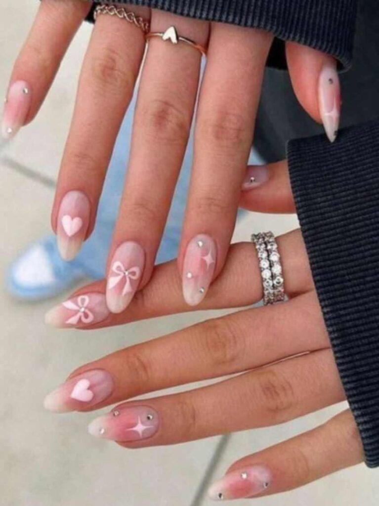 Pink Nails Design and ideas featuring soft hues, shimmer accents, and a graceful shape—perfect for every beauty lover, from teenage girls to teachers, housewives, and brides seeking a chic, versatile manicure.