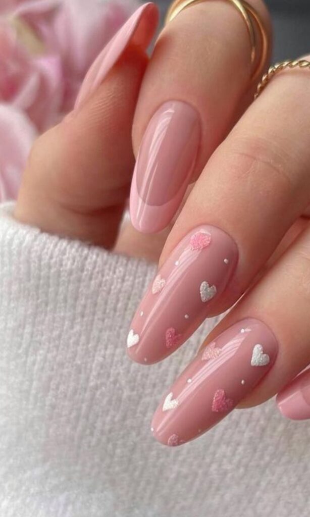Pink Nails Design and ideas featuring soft hues, shimmer accents, and a graceful shape—perfect for every beauty lover, from teenage girls to teachers, housewives, and brides seeking a chic, versatile manicure.