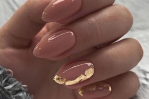 "Elegant almond-shaped nails with chic nude polish, perfect for professional women and fashion-forward brides" "Trendy almond nail design: soft pastel ombré with subtle glitter, ideal for college girls and young professionals" "Sophisticated almond nail art: minimal geometric accents in metallic tones, bridging work and party styles" "Romantic almond nails: soft pink gradient with delicate pearl embellishments, perfect for wedding celebrations" "Bold almond nail statement: deep burgundy with matte finish, empowering look for confident women" "Versatile almond nail design: neutral base with intricate white lace-like patterns, suitable for teachers and creatives" "Glamorous almond nails: holographic shine meets classic French tip, celebrating feminine elegance" "Winter-inspired almond nails: icy blue with silver snowflake details, chic for holiday parties" "Vibrant almond nail art: tropical sunset ombré with golden highlights, perfect for Valentine's celebrations" "Minimalist almond nails: clean nude base with single accent rhinestone, embodying understated sophistication"