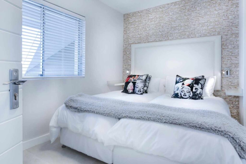Stylish black and white dream bedroom with elegant decor, cozy bedding, and chic minimalist furniture. Perfect for beauty lovers, brides, and modern women seeking luxury & simplicity.