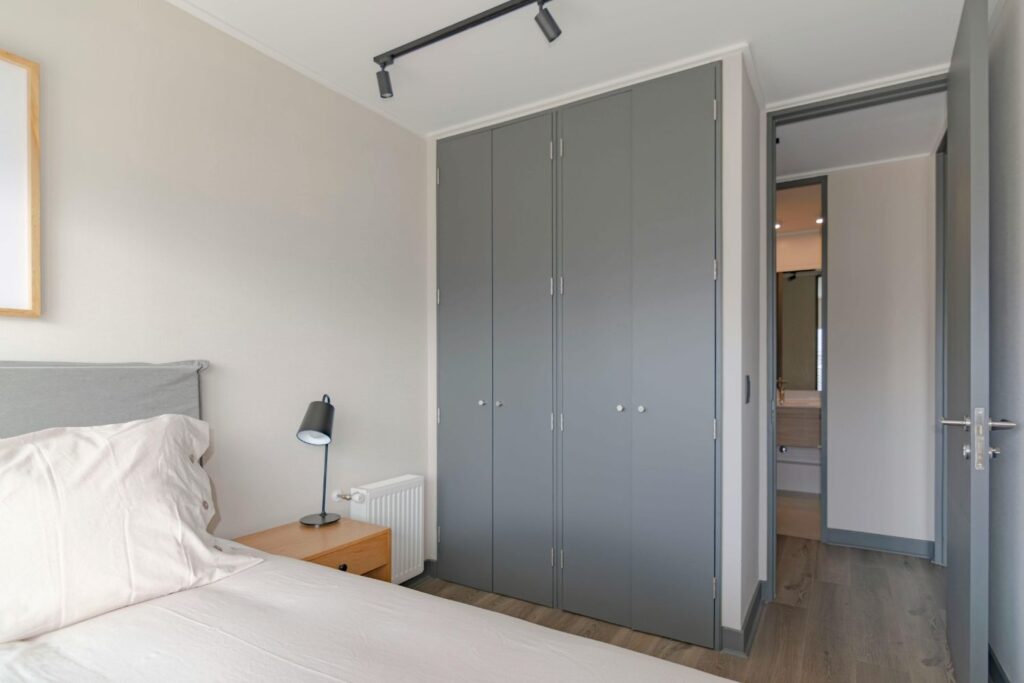 Stylish black and white dream bedroom with elegant decor, cozy bedding, and chic minimalist furniture. Perfect for beauty lovers, brides, and modern women seeking luxury & simplicity.